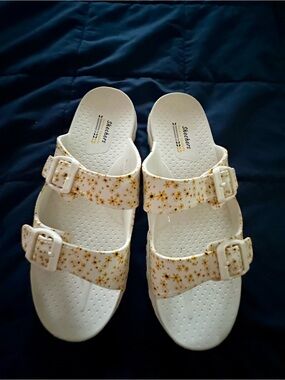 Skechers White Slide Sandals with yellow flower Print
